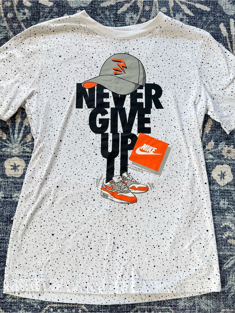 Kids White Speckled 'Never Give Up' Graphic Tee with Orange Accents